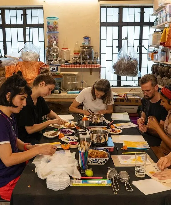 Participants at our botanical ink workshop learn to extract pigments from natural materials. These sessions offer a unique insight into ancestral art practices and the beauty of creating with resources from the world around us.