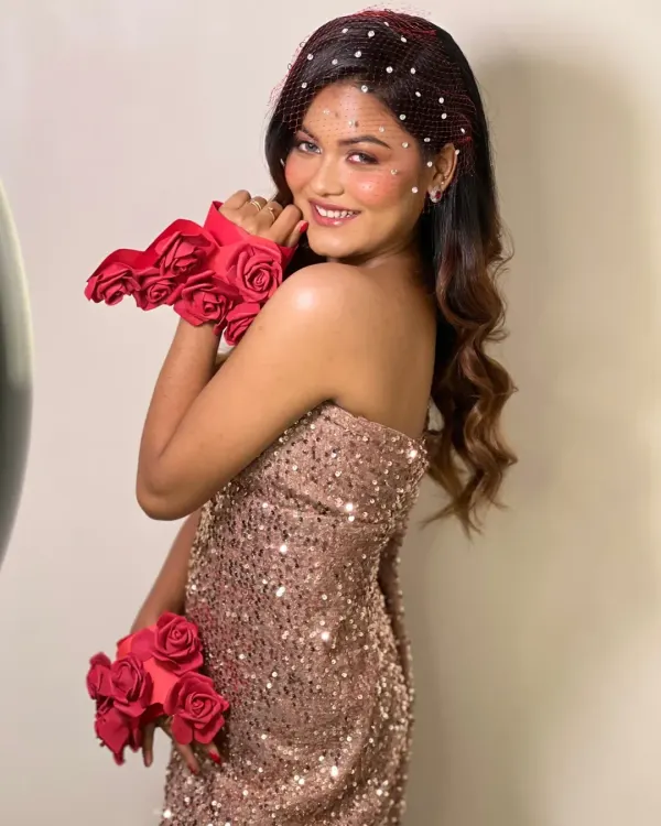 A polo-inspired creative look I designed, featuring a sequin dress, a red net veil with crystals, and unique fabric rose haath phools.