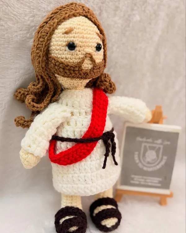 My handmade crochet Jesus Christ doll, a symbol of peace and faith. This 8-inch doll is made from 100% cotton yarn and is perfect as a spiritual keepsake or a gentle toy for children.