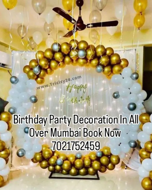 A beautiful gold and white balloon ring setup perfect for a living room. I can bring all the elements, including the shimmer curtain and balloon pillars, to create a festive corner in your home.
