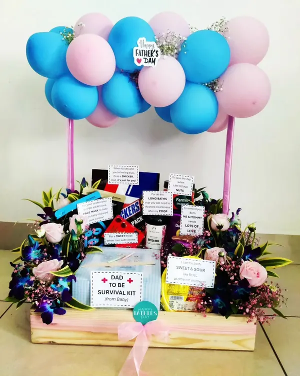 A special gift for Father's Day, this 'Dad to Be Survival Kit' is a fun way to celebrate the new dad. It's packed with snacks and goodies 'from the baby' to help him on his new adventure.