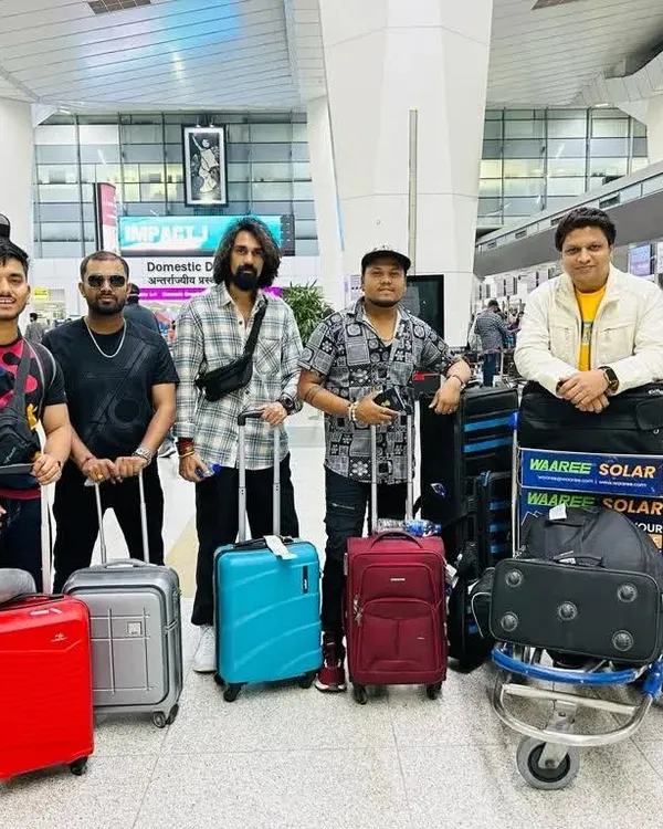 The journey begins. The full band at the airport, packed and ready to head to Colombo for an international show. We handle all our logistics for a hassle-free experience.