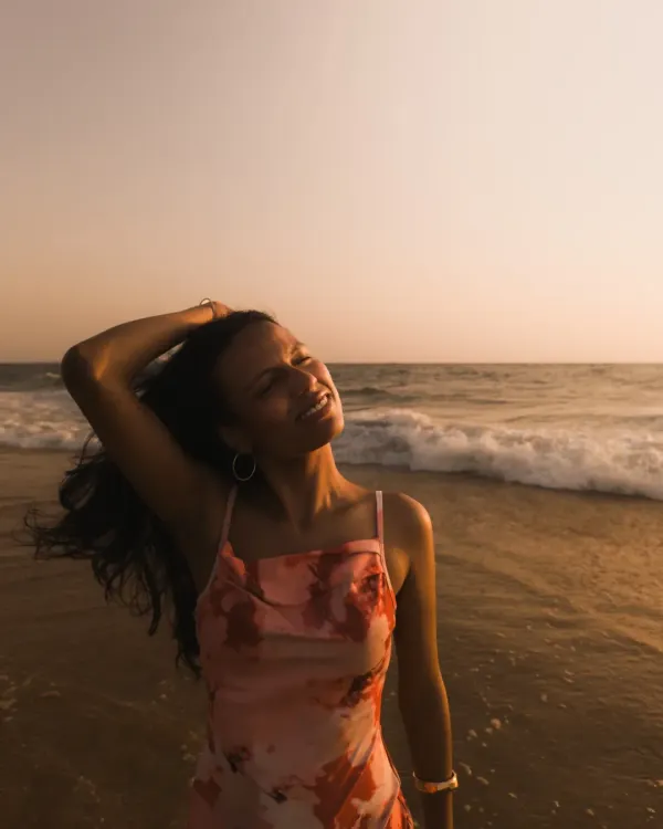 Capturing a moment of pure bliss during the golden hour on a Goa beach. My portrait sessions are all about natural light and authentic expressions, creating timeless travel photos.