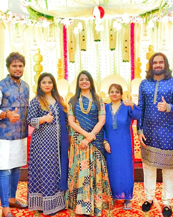 A group photo with my amazing team after a successful musical wedding phere. Their talent and dedication are the backbone of my events.