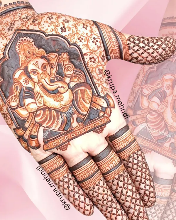 Happy Ganesh Chaturthi! A detailed portrait of Lord Ganesha on the palm, perfect for bringing blessings and removing obstacles during the festive season.