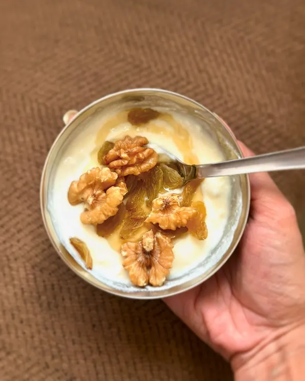 My go-to hack for sweet cravings: a simple bowl of Greek yogurt topped with walnuts, raisins, and a drizzle of honey. It's healthy, tasty, and incredibly satisfying.