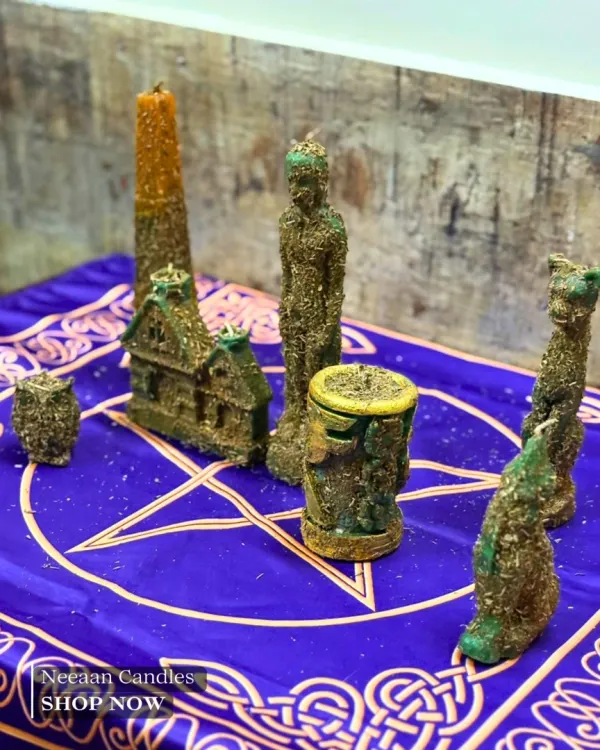 Create your own magic with our Customizable Ritual Candle Kit. This set, displayed on a pentagram cloth, includes candles shaped like a house, a cat, an owl, and human figures, all infused with herbs for your spiritual needs.