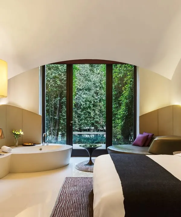 This is our Lake Access Room, where your private space opens directly to the calming water. It is designed for ultimate peace and privacy, blending luxury with nature.