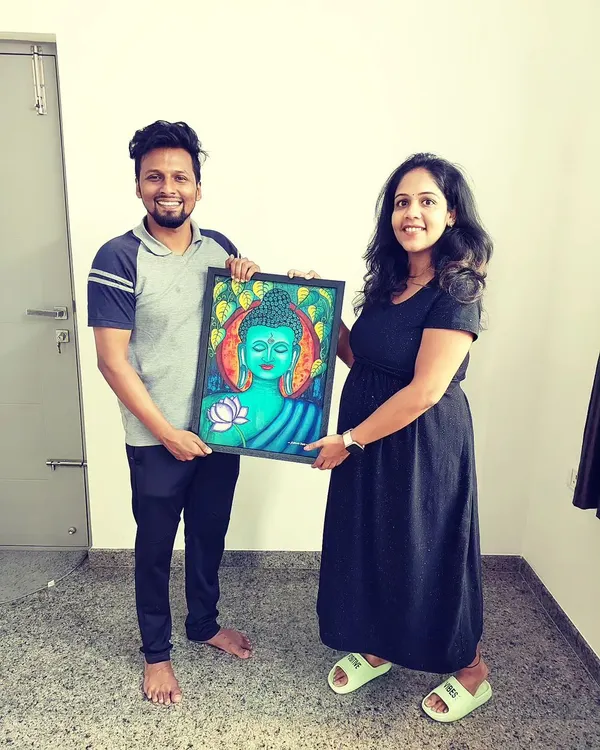 Delivering a custom Buddha painting to a happy client. I was pregnant here, and it was so special to create art during that time.