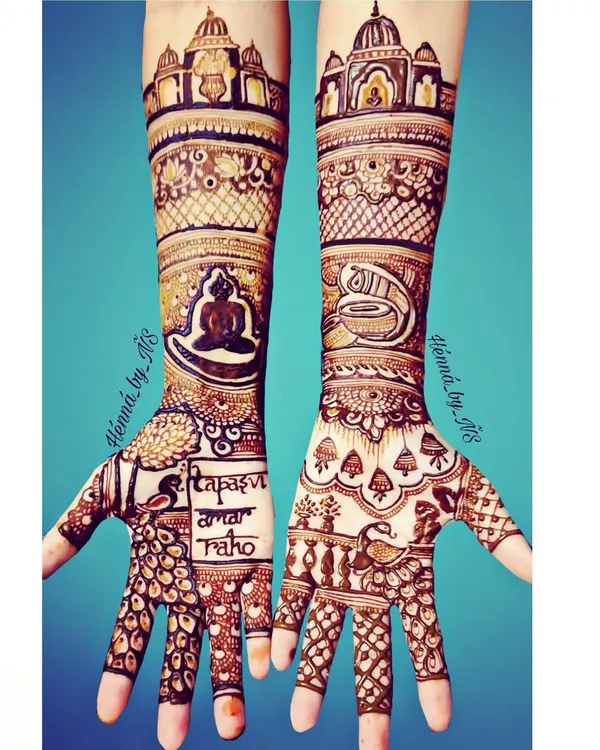 This intricate design was for a Siddhitap Tapasvi. One hand features a meditating Tirthankara figure, while the other shows a sacred Shankha, or conch shell, both surrounded by detailed traditional patterns.