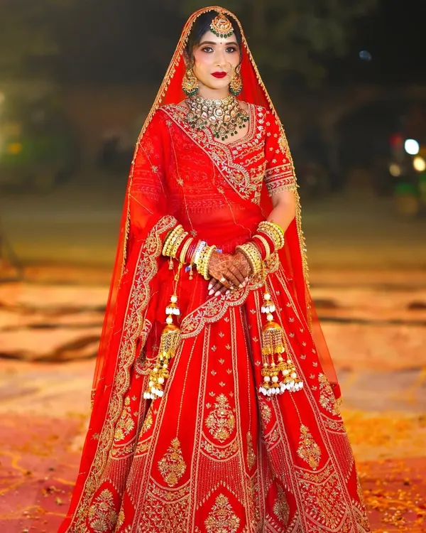 This is the classic red bridal look that so many of my brides dream of. I made sure she looked absolutely radiant and felt like a queen for her phera ceremony.