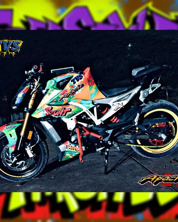 This is how we make a statement. 🎨🔥 I designed this custom graffiti wrap for a TVS Apache 310 R stunt bike. We took it from stock to showstopper for Motosoul Goa. Your ride is my canvas, let's make some art.