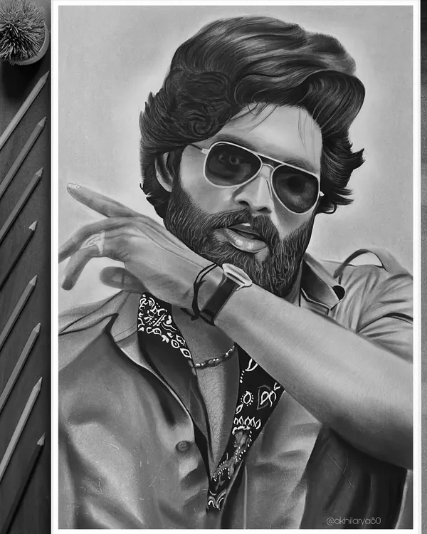 The finished portrait of Allu Arjun as Pushpa. This detailed graphite sketch on A3 paper captures his intense look and iconic style from the movie.