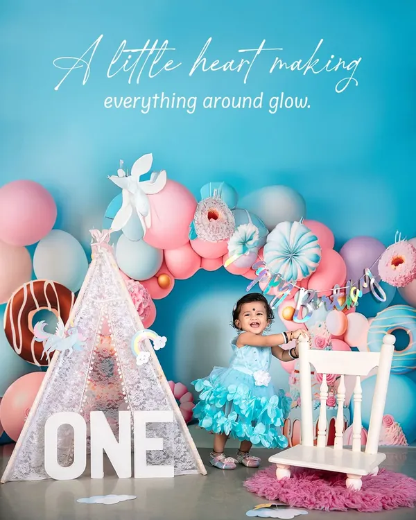A little heart making everything glow. This first birthday setup with a donut and candy theme is all about sweet colors and even sweeter smiles, celebrating one whole year of joy.
