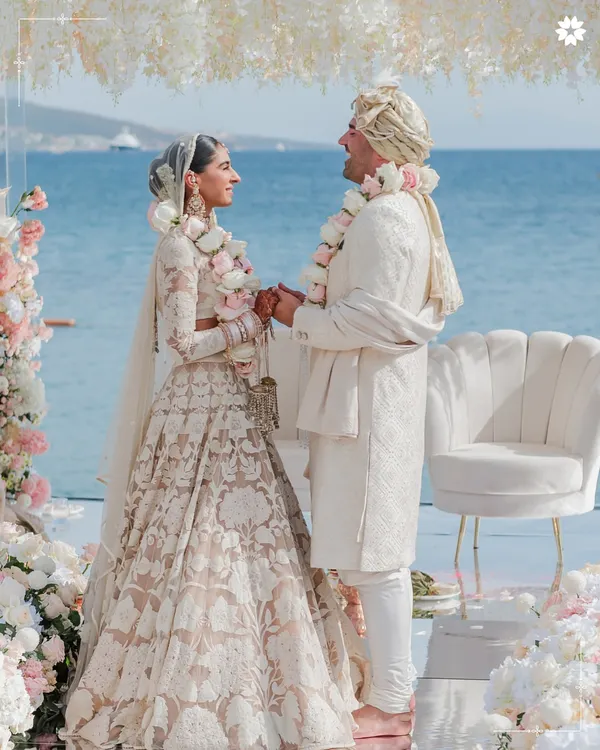 A serene moment from a destination wedding in Turkey, where the couple's vows are framed by the endless sea. We work to ensure the culinary experience is as breathtaking as the view.