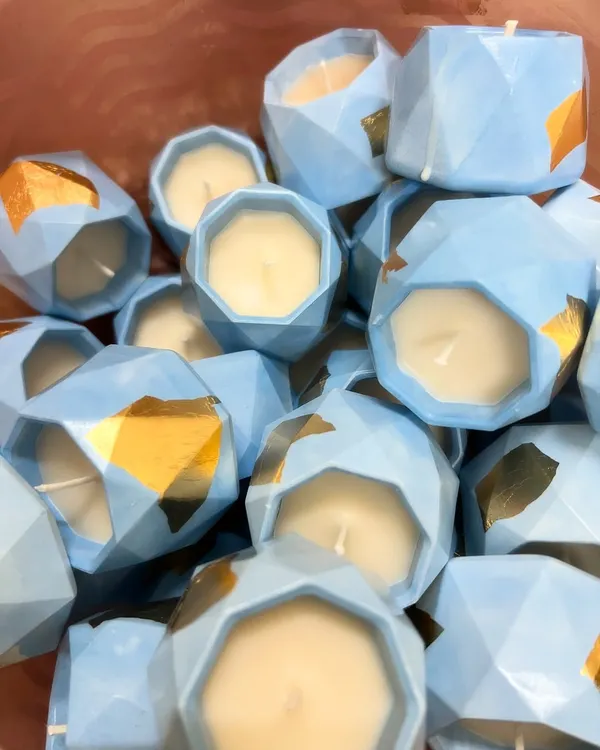 We customized these cute blue geometric candle jars with gold leaf for a baby announcement hamper. We love being a part of your special moments.