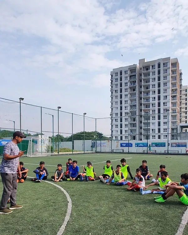 A team talk with our U15 football squad. Our coach discusses strategy and tactics on the turf as the team prepares for the upcoming KSFA Youth League.