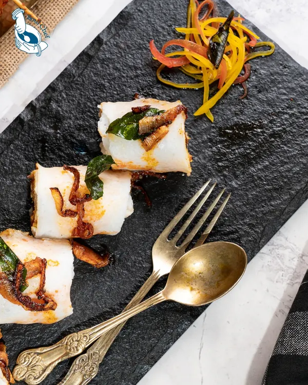 These Chicken Gassi Rolls with a curry leaf aioli are a perfect example of my coastal-inspired cuisine. The flavors are bold and authentic, presented in a modern, bite-sized format that is perfect for any event.