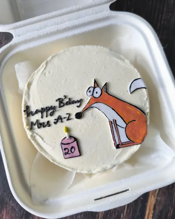 This sly fox bento cake is a fun and quirky design for a 20th birthday. The hand-drawn character adds a playful touch to the celebration.