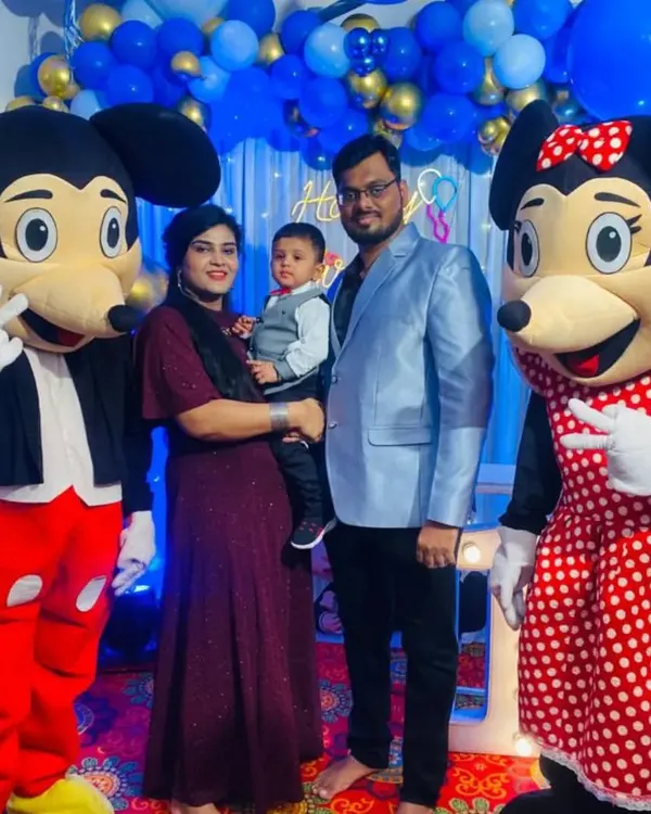 It's not just about decorations; we bring the fun too. Here, our Mickey and Minnie Mouse mascots are posing with the family, making the little one's birthday party extra special and interactive.