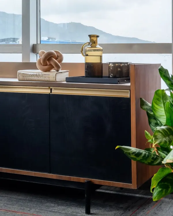 I love getting to design and build one of a kind pieces for a space. This console, with its combination of drawer and shutter storage, was tailor made for an office, providing stylish storage that you won't find in a catalog.