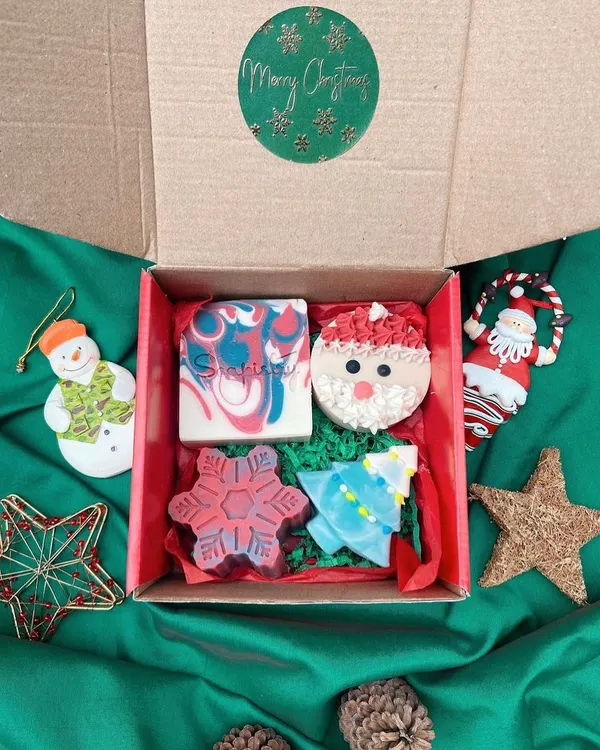 My Soapistry Christmas Gift Box is the perfect present! It includes a full-sized bar, a Santa soap, a Christmas tree, and a snowflake, all handmade and beautifully packaged.