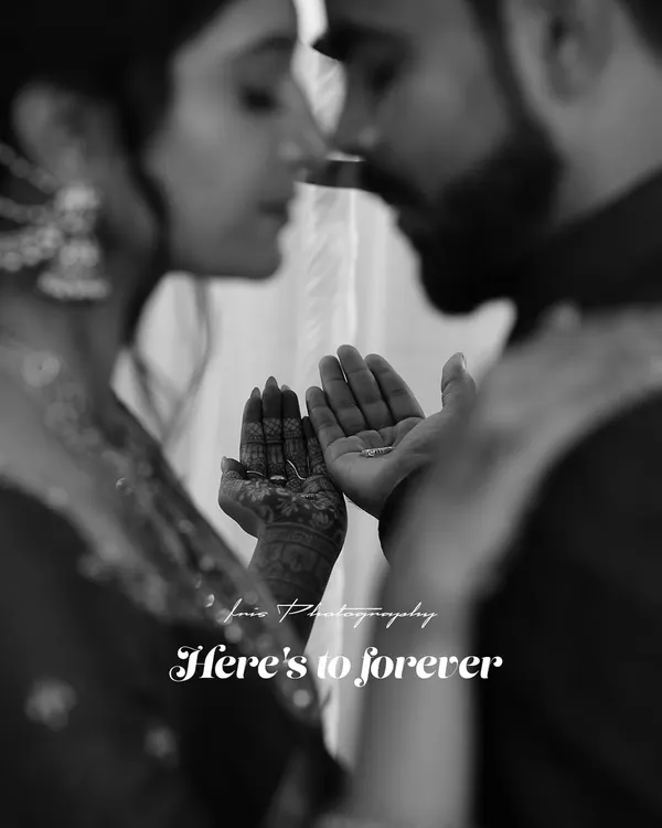 A black and white version of the "Here's to forever" shot, which gives the moment a timeless, classic, and emotional feel.