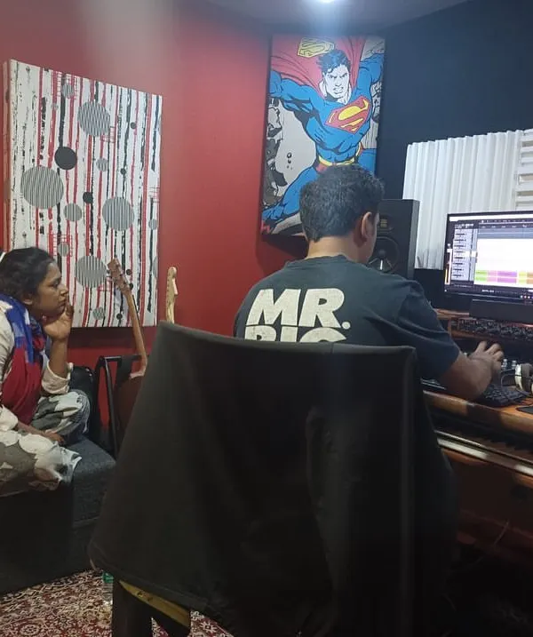 A candid shot from a joyous recording session. Making music on a rainy day with talented artists is the best way to spend time.