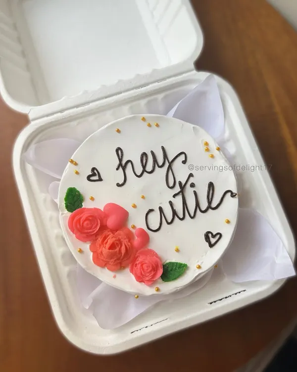 A sweet and simple "hey cutie" bento cake, perfect for making someone's day. This one features delicate buttercream roses and is packed in my signature eco-friendly box.