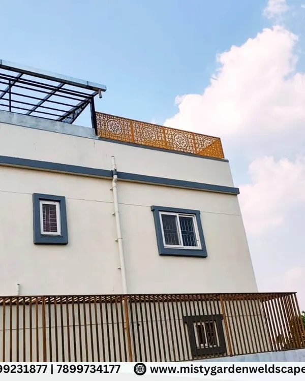 This privacy safety structure at Celebrity Pride Access combines modern CNC cut panels on the terrace with classic jali bricks, creating a secure and stylish barrier that allows for light and airflow.