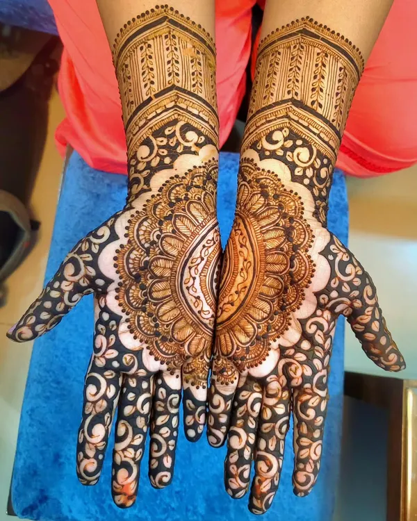 Starting off the festive season with this gorgeous mandala pattern. The design is centered on the palm and extends up the wrist, making it a classic and elegant choice for any occasion.