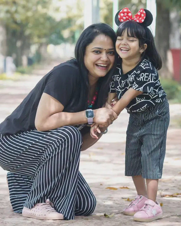 An outdoor park setting is perfect for capturing genuine moments of joy. My goal in a family lifestyle session is to create a fun atmosphere where you can forget the camera and just enjoy being together.