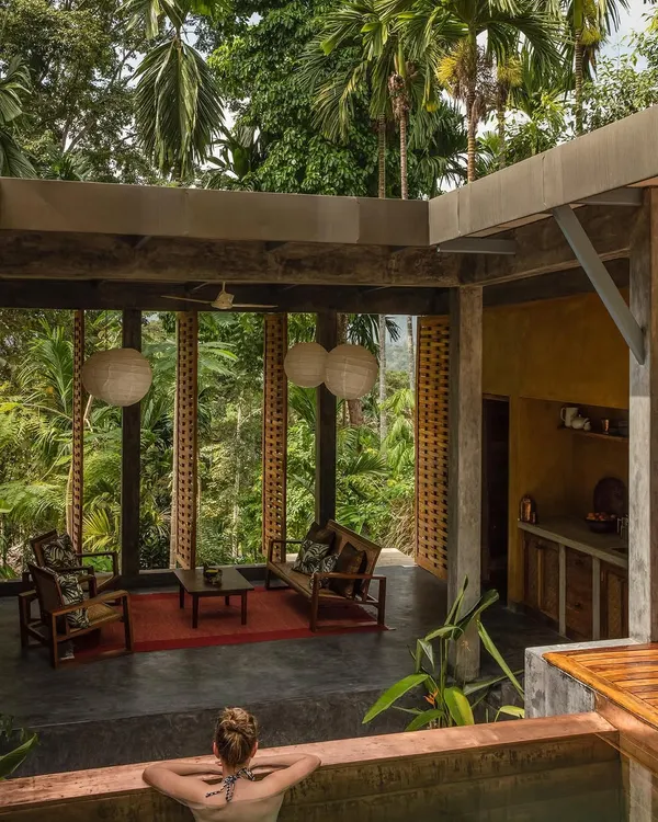 This private villa at the Jalakara hotel in the Andamans captures my approach to tropical luxury. The design features a personal plunge pool and an open living area that seamlessly merges with the surrounding rainforest, using natural materials and cross-ventilation for sustainable comfort.