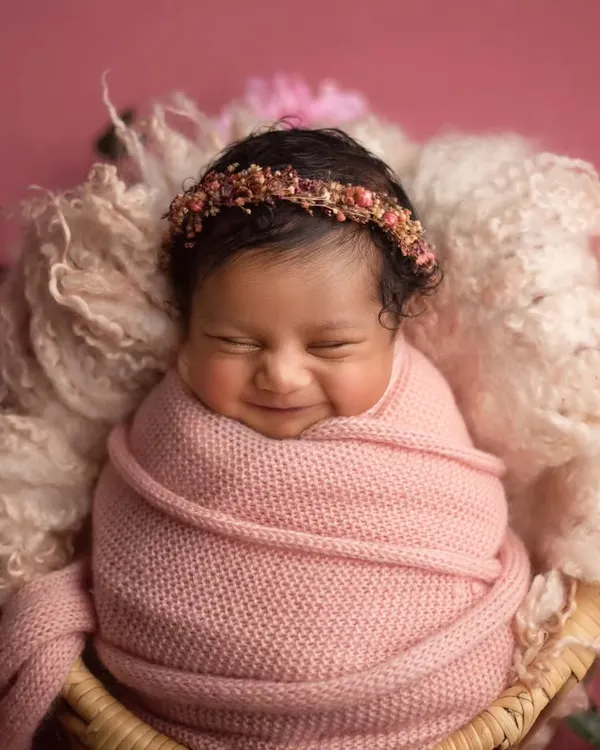 This is pure happiness. Capturing a big, cheesy grin like this is what makes my job the absolute best. This little girl's smile just melts my heart.