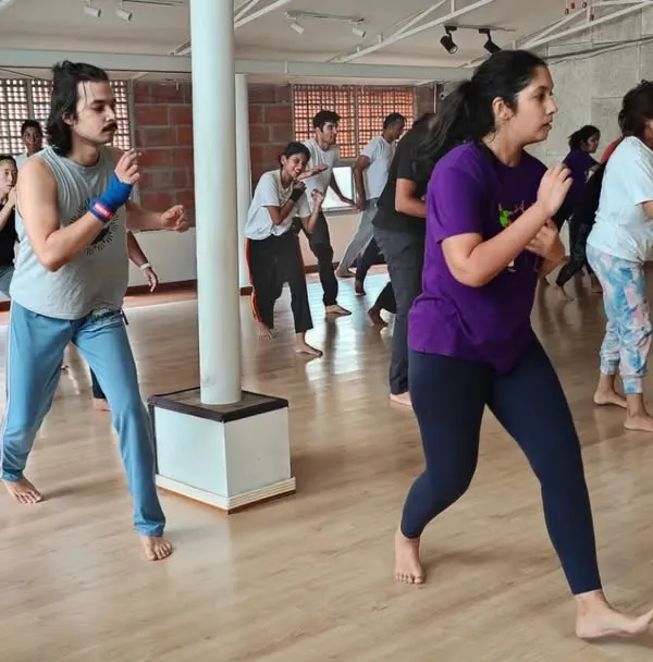 This is where it all begins. A group of beginners learns the basic Ginga stance, the foundation of all Capoeira movement. We make sure everyone feels comfortable and confident.