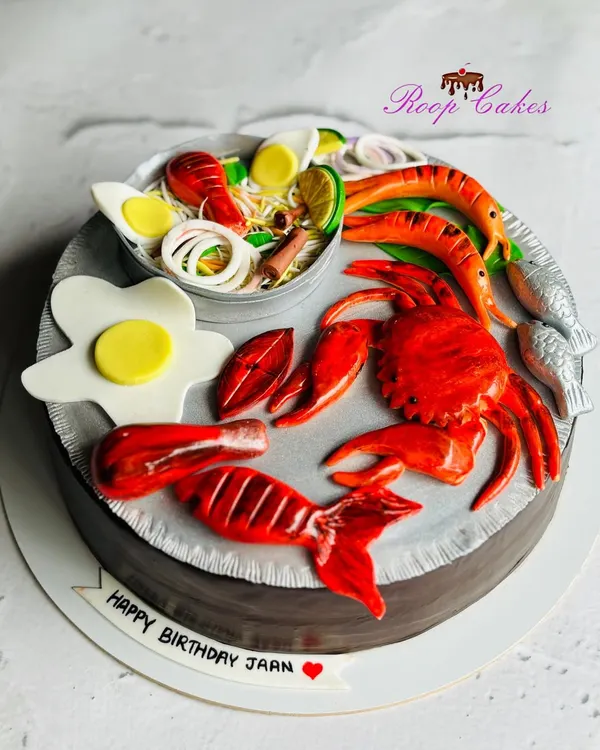 A feast for the eyes and the heart. It may look like a seafood platter, but this is a 100% eggless cake with every detail, from the crab to the prawns, being fully edible.