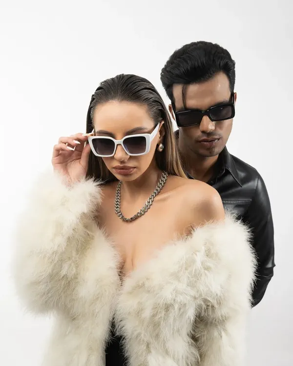 A high-fashion studio concept shoot featuring a male and female model styled in leather and fur. This image demonstrates my ability to direct and capture powerful, editorial-style visuals with dynamic posing and professional lighting.