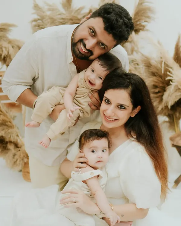 This is what pure happiness looks like. I arranged this family of four, including their adorable twins, in my Faridabad studio against a boho-chic pampas grass setup to create a warm, loving, and perfectly balanced family portrait.