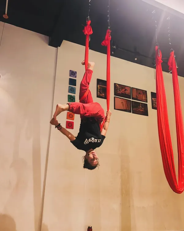 A playful inversion during practice. I am always working on new class schedules and timings to make aerial yoga accessible to more people.