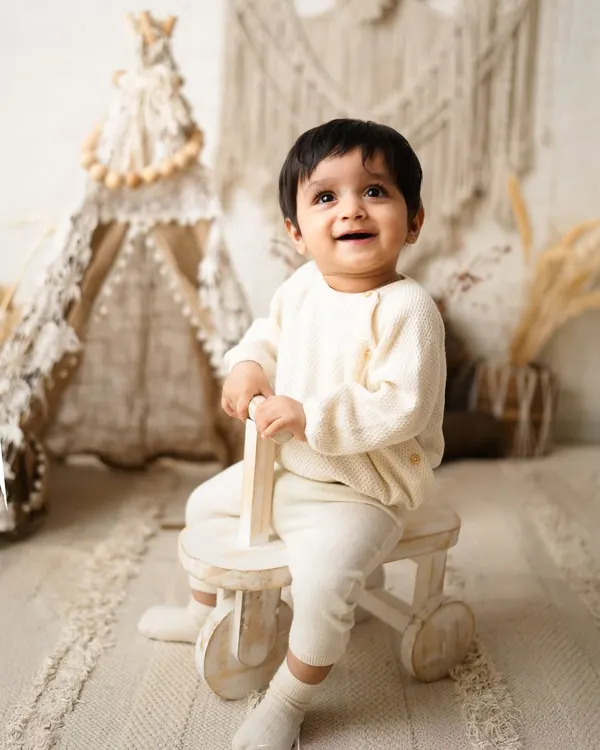 The purest, most joyful smile from a baby boy during his boho-themed sitter session. Capturing these happy expressions is the best part of my job.
