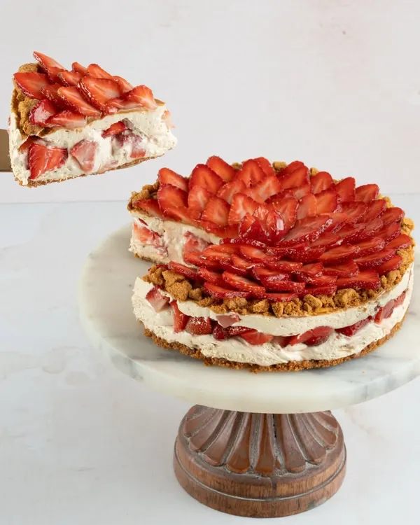 This is our Fresh Strawberry Biscoff Cheesecake, one of our most loved creations. I pair creamy cheesecake and fresh, juicy strawberries with the wonderful crunch of a Biscoff biscuit base. A slice of this is pure happiness.