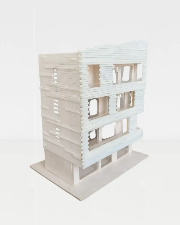 Physical models are an integral part of our design process. This model allows us to study the building's form, facade articulation, and the play of light and shadow in a tangible way that drawings cannot capture.