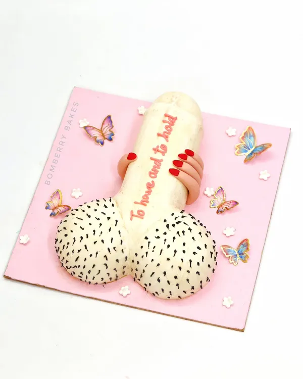 A cheeky "To Have and To Hold" bachelorette cake, perfect for a bride-to-be with a great sense of humor.