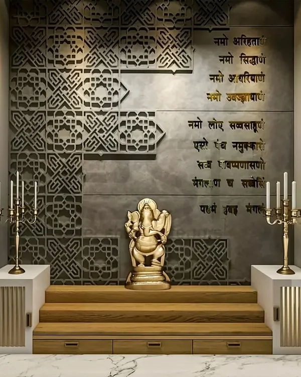 This custom pooja unit is a work of art, featuring intricate jaali work, sacred verses, and a multi-level wooden platform for idols. The design creates a truly divine atmosphere.