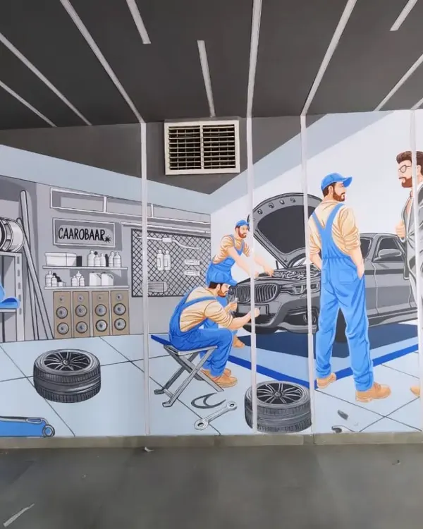 A detailed, comic-book style mural for CAAROBAR in Ludhiana, depicting a bustling auto workshop scene. This artwork tells the story of their business and the services they provide.