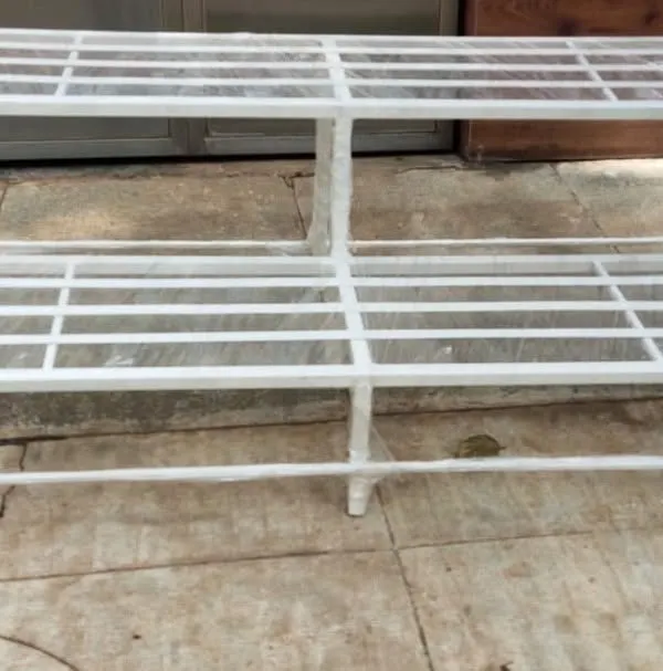 For a bright and modern look, we offer a crisp white powder-coat finish. This two-tier stand is wrapped in plastic, fresh from the workshop and ready for delivery.