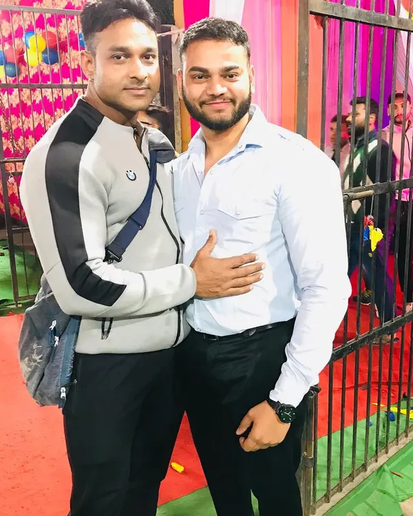 With my brother Arun, a Mr. India and Mr. Asia bodybuilding champion. Surrounding myself with the best helps me grow as an athlete and a coach.