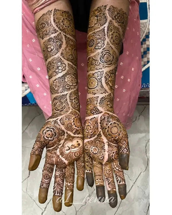 A clear view of a completed semi-bridal design, showcasing a mix of floral work, leaf patterns, and detailed fillers. Learning to balance these elements is a core part of my training.
