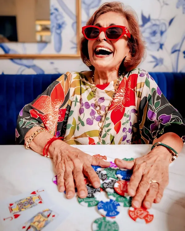 A shot from a high-energy lifestyle campaign I styled for a patisserie. We created a "granny-core" themed poker night, using bold prints, colorful accessories, and playful props to capture a feeling of fun and joyful chaos.