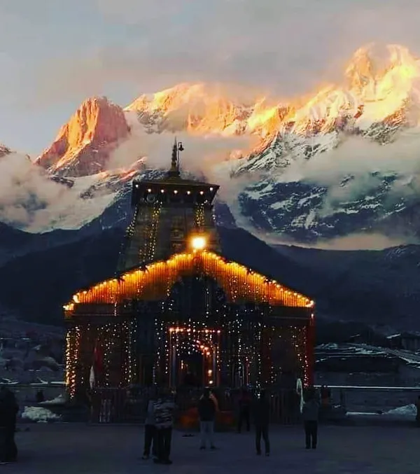 The sacred Kedarnath Temple illuminated against the Himalayan peaks. Visiting such holy sites is a key part of my Indian retreats. The energy here is ancient and powerful, offering a deep connection to Lord Shiva and the traditions of Hinduism.